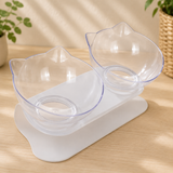 Gamelle double surélevée avec support antidérapant, bols en forme de tête de chat, support blanc, deux bols coloris transparent.