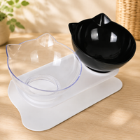Gamelle double surélevée avec support antidérapant, bols en forme de tête de chat, support blanc, un bol noir et un bol transparent.